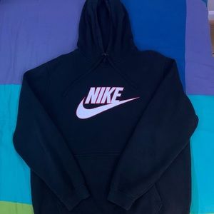 Black Nike hoodie with white and red logo